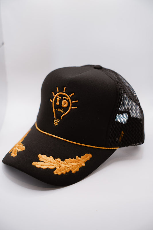 Foam Trucker Hat | Black w/ Gold Logo & Oak Leaves